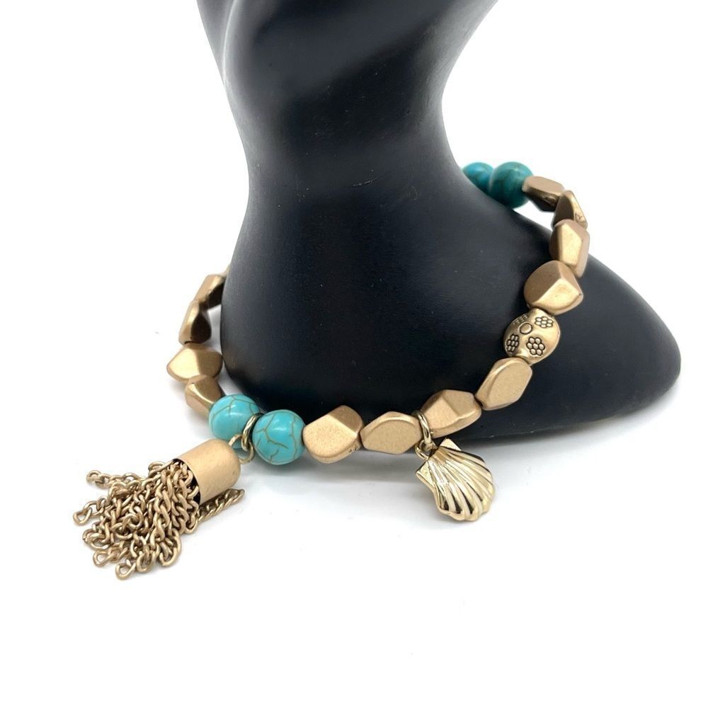 Turquoise and Gold Beads Stretch Bracelet with Tassel and Shell Decor